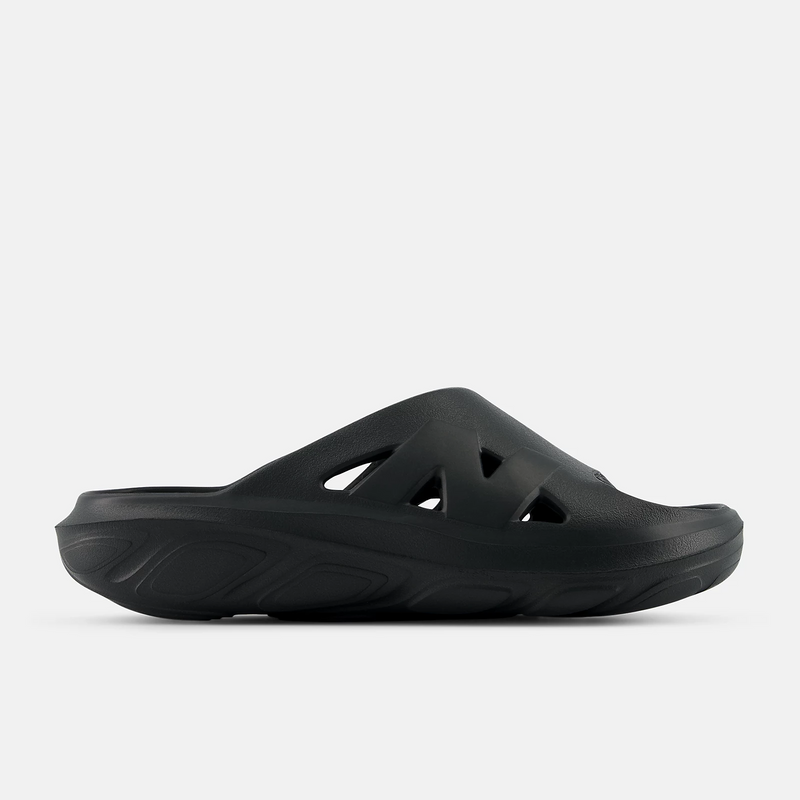 New Balance Fresh Foam RCVRY Slide sandals in black featuring lightweight foam sole and cutout upper design, side view.