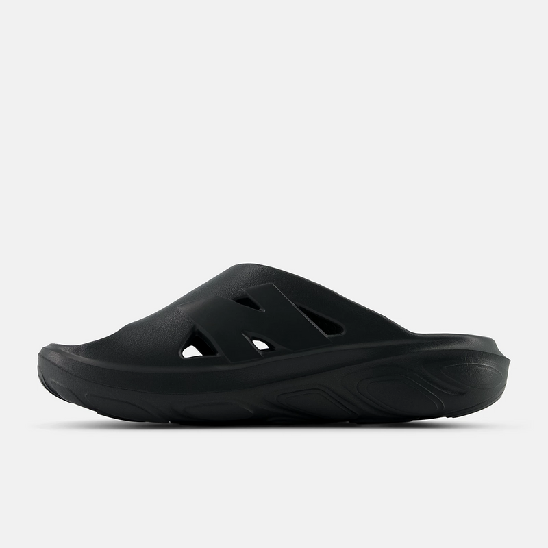 New Balance Fresh Foam RCVRY Slide sandals in black with foam cushioning and perforated upper design, side view.