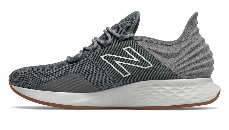 New Balance Fresh Foam Roav Tee Shirt running shoes in gray and white with mesh upper, Fresh Foam midsole, and gum outsole, side view.