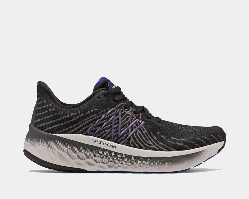 New Balance Fresh Foam Vongo v5 running shoes in black with purple accents, mesh upper, and cushioned Fresh Foam midsole, side view.