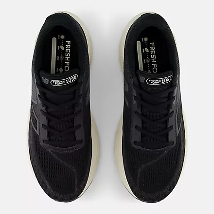 New Balance Fresh Foam X 1080v14 running shoes, black mesh upper with white sole, top view showing lace system and branding.
