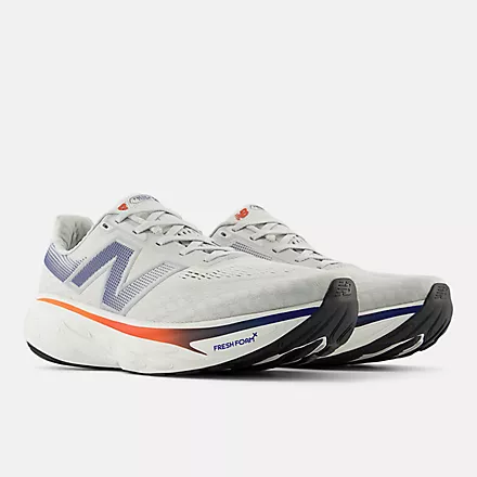 New Balance Fresh Foam X 1080v14 running shoes in light gray with blue accents, Fresh Foam cushioning, and orange detailing, front-side angle.