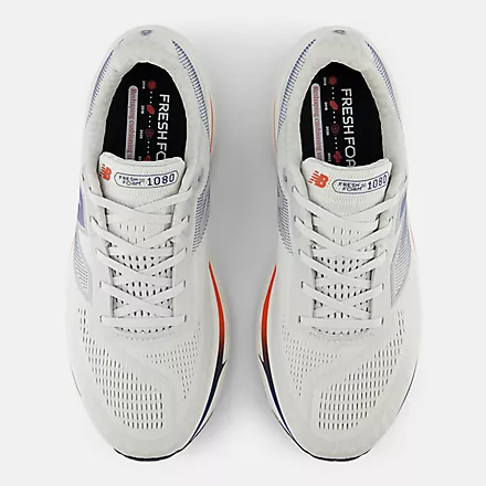 New Balance Fresh Foam X 1080v14 running shoes top view in white with breathable mesh upper and lace-up design.