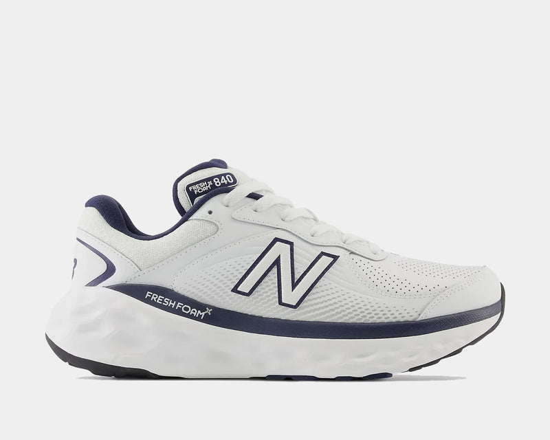 New Balance Fresh Foam X 840F running shoes in white with navy accents, breathable mesh upper, and cushioned midsole, side view.