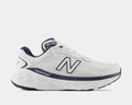 New Balance Fresh Foam X 840F running shoes in white with navy accents, breathable mesh upper, and cushioned midsole, side view.