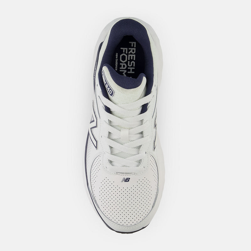 New Balance Fresh Foam X 840F running shoes in white with navy accents, perforated toe box, and lace-up closure, top view.