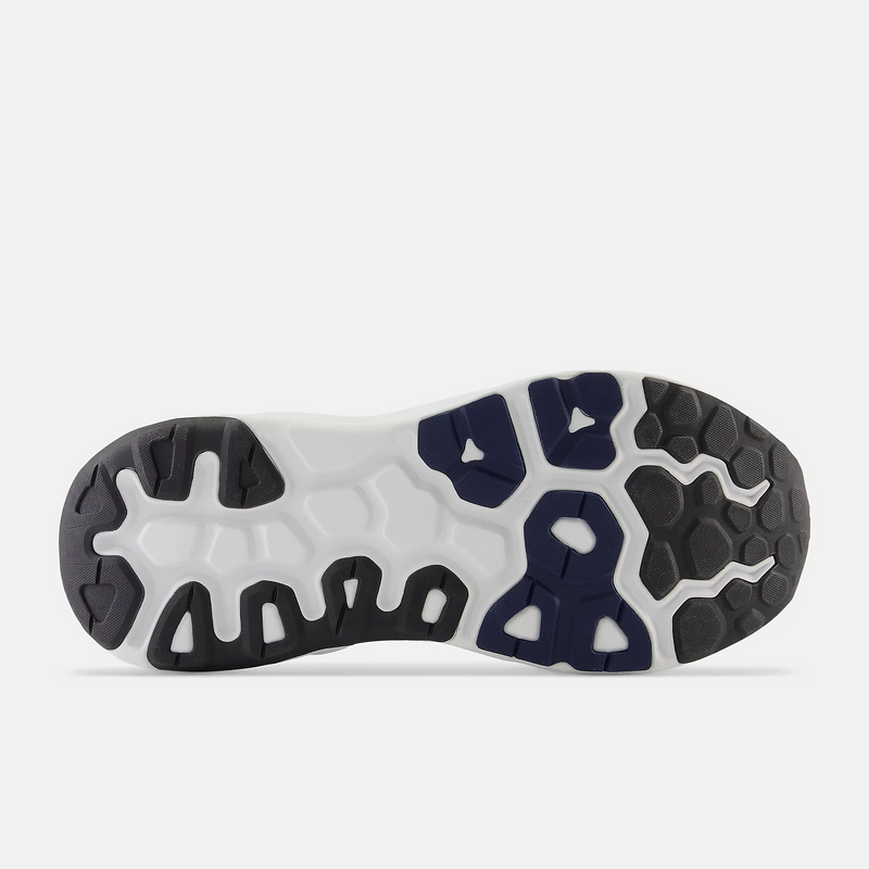 New Balance Fresh Foam X 840F running shoe outsole in black, navy, and white with hexagonal tread pattern and durable grip.