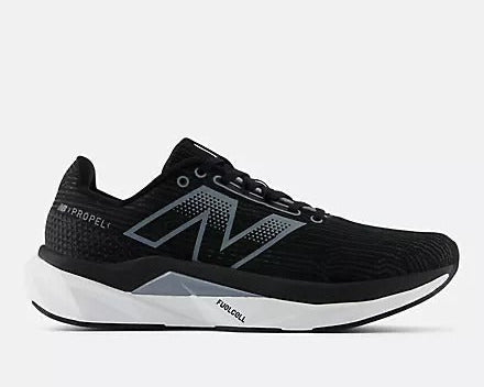 New Balance FuelCell Propel v5 running shoes in black with white midsole and gray accents, side view.