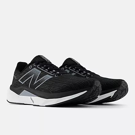 New Balance FuelCell Propel v5 running shoes in black with silver accents, featuring a mesh upper and lightweight FuelCell midsole, front angled view.