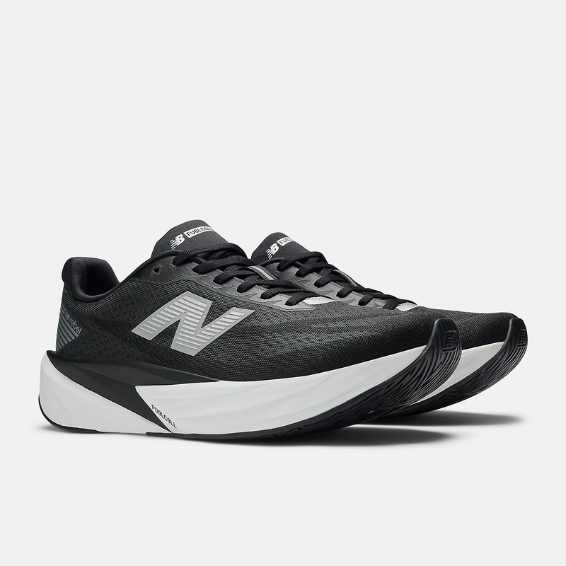 New Balance FuelCell Rebel v5 running shoes in black and white with breathable mesh upper and curved sole design, angled front view.
