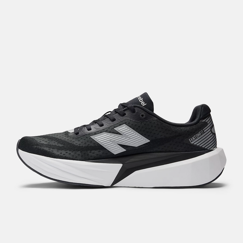 New Balance FuelCell Rebel v5 running shoes in black and gray with mesh upper and thick lightweight midsole, side view.