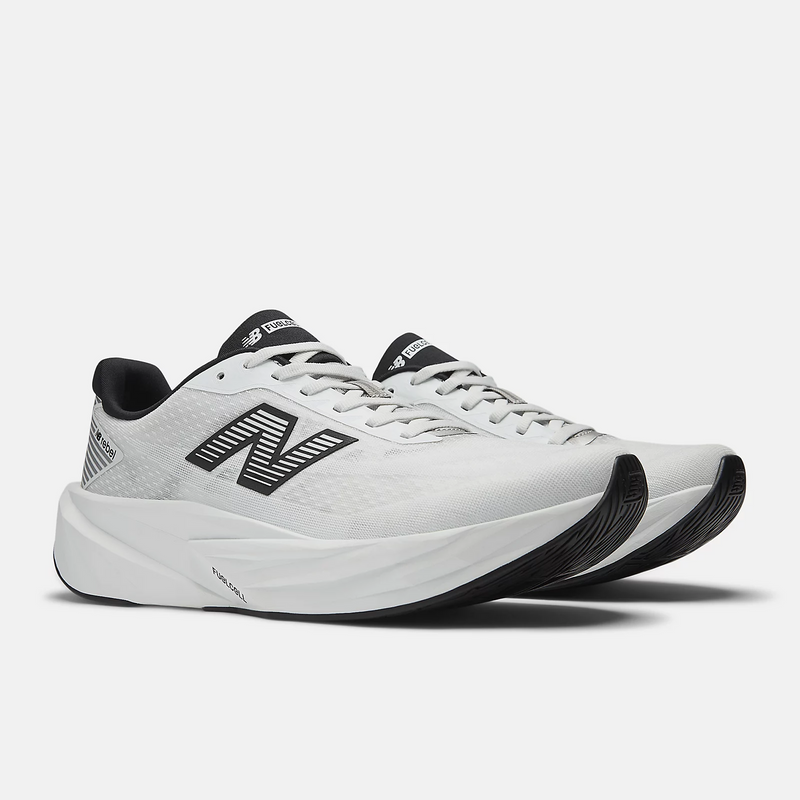 New Balance FuelCell Rebel v5 running shoes in white with black accents, lightweight engineered mesh upper, front angled view.