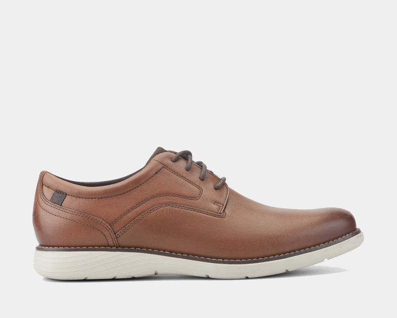 Rockport Garett Plain Toe shoes in brown leather with contrast stitching and white rubber outsole, side view.