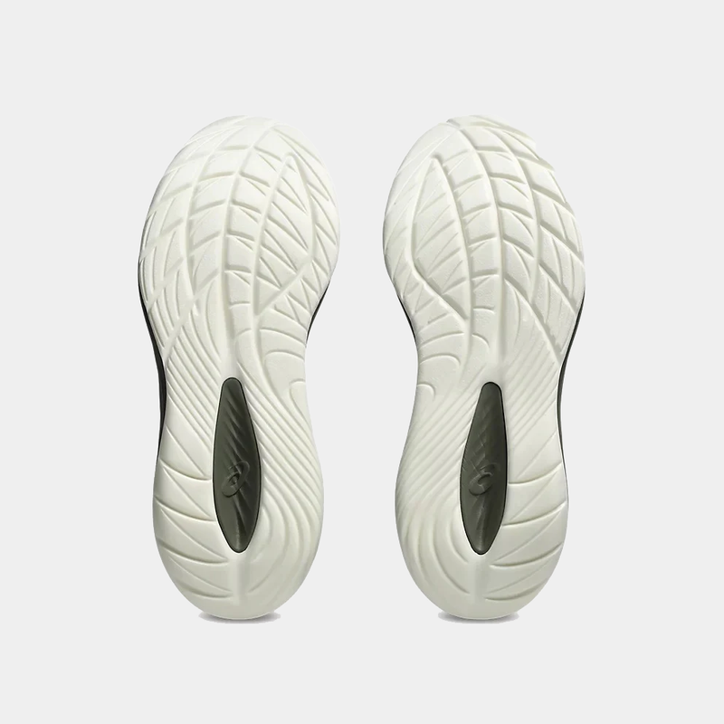 Asics Gel-Cumulus 27 GTX running shoes outsole with durable rubber tread and flex grooves in white and black, sole view.