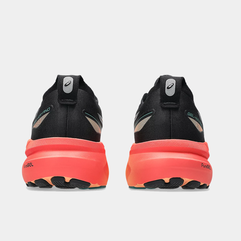 Asics Gel-Kayano 31 running shoes in black and coral with a PureGEL midsole, back view highlighting heel support.