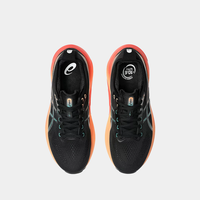 Asics Gel-Kayano 31 running shoes with black mesh upper, teal and orange accents, and cushioned midsoles, top view.