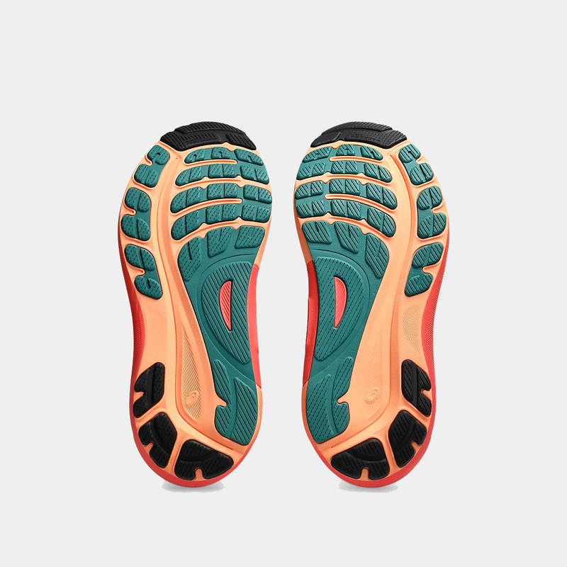 Asics Gel-Kayano 31 running shoes outsole showing patterned tread with teal, orange, and black accents for traction and durability.