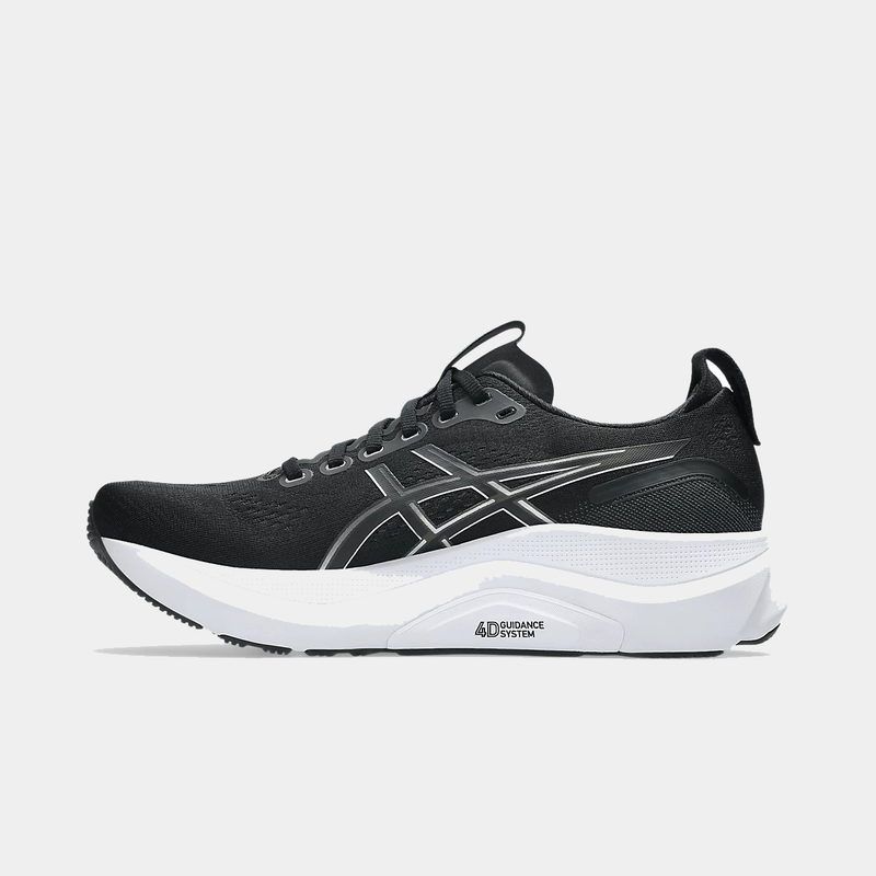 Asics Gel-Kayano 32 running shoes in black with silver accents, breathable mesh upper, and 4D Guidance System, side view.