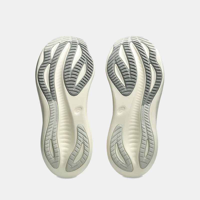 Asics Gel-Nimbus 27 running shoes outsole with AHAR rubber and flex grooves in white and gray, bottom view.