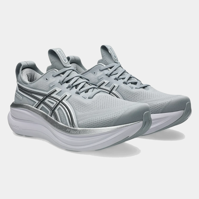 Asics Gel-Nimbus 28 ATC running shoes in light gray with breathable mesh upper, silver accents, FF Blast cushioning, and curved sole, angled front-side view.