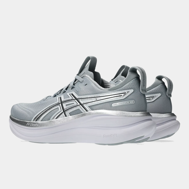 Asics Gel-Nimbus 28 ATC running shoes in light gray with metallic silver accents, cushioned midsoles, and pull tabs, side-back view.
