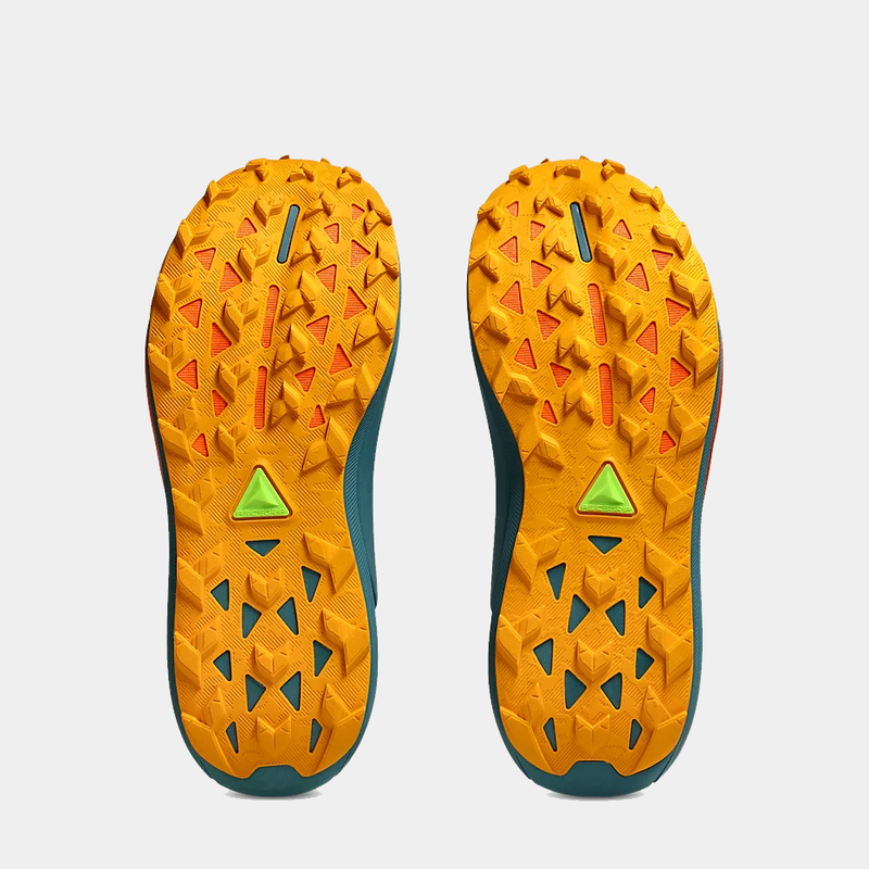 Asics Gel Trabuco 13 trail running shoe outsole in bright orange with multidirectional lugs and green detailing, bottom view.