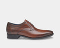 A brown plain toe oxford shoe with a lace-up closure.