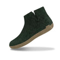 Forest green wool ankle boot with soft beige leather sole and V-cut side detail, designed for warmth, comfort, and natural breathability indoors.