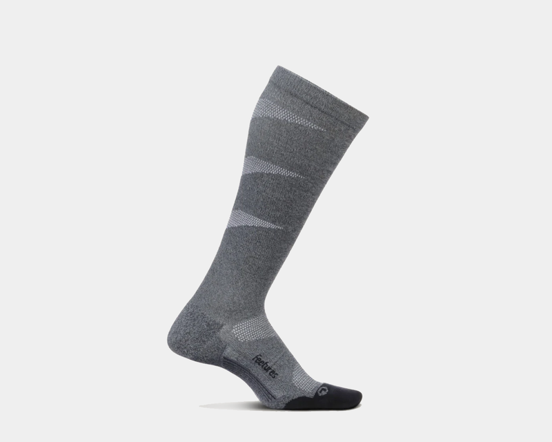 Feetures Graduated Compression Light Cushion Socks in gray and black, knee-high design with light cushioning, side view.