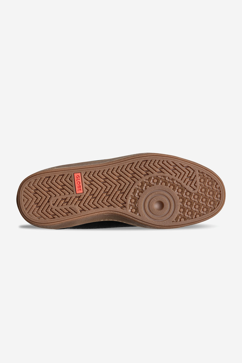 Bottom view of black GS Boot with brown gum outsole and intricate tread