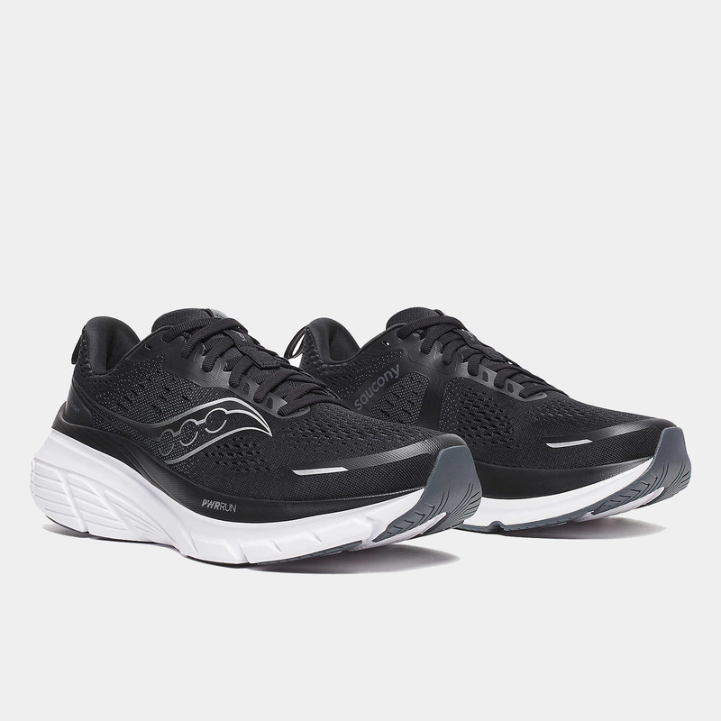 Saucony Guide 18 running shoes in black with mesh upper and white PWRRUN cushioning midsole, angled front view.