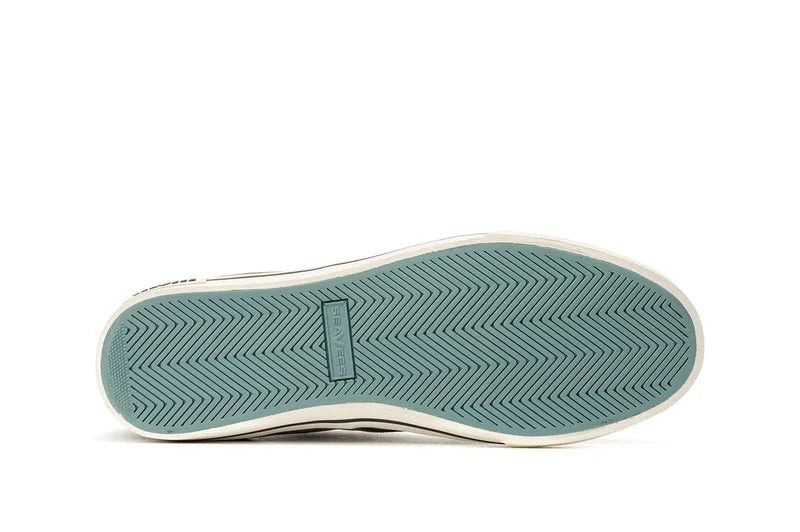 SeaVees Hermosa shoes outsole with textured herringbone pattern in teal rubber and embossed branding, sole/bottom view.
