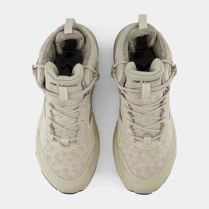 New Balance Hierro Hiker hiking shoes in beige, featuring a durable mesh upper, secure lace system, and padded collar, top view.