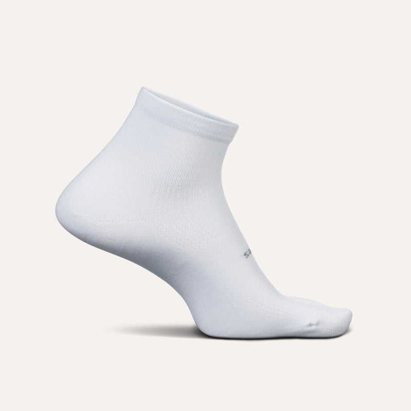 Feetures High Performance Max Cushion Quarter socks in white with ribbed cuff and reinforced cushioning, side view.