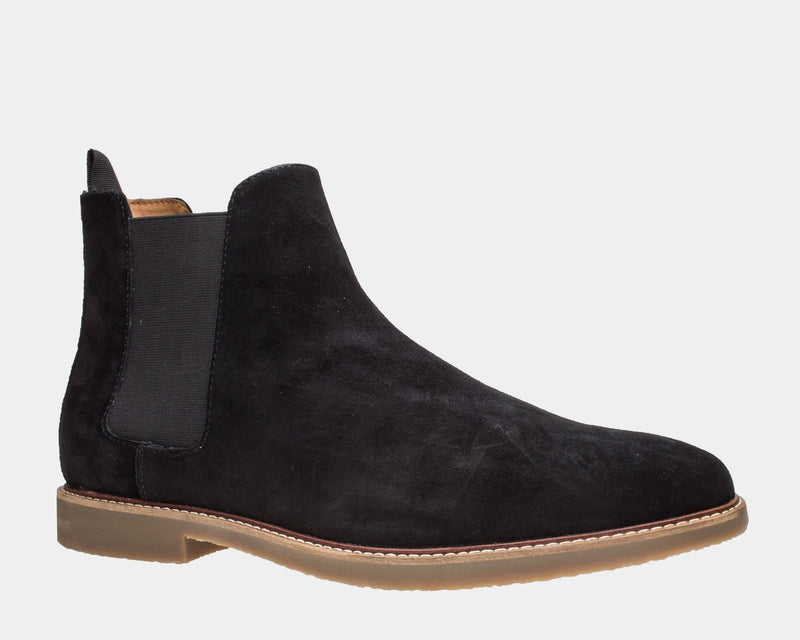 Steve Madden Highline Chelsea Boot in black suede with elastic side panels and tan sole, side view.
