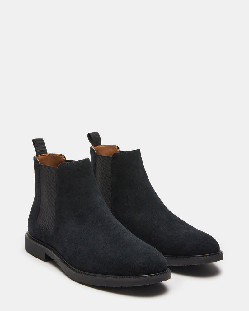 Steve Madden Highline Chelsea Boot in black suede with elastic side panels and pull tabs, front angled view.