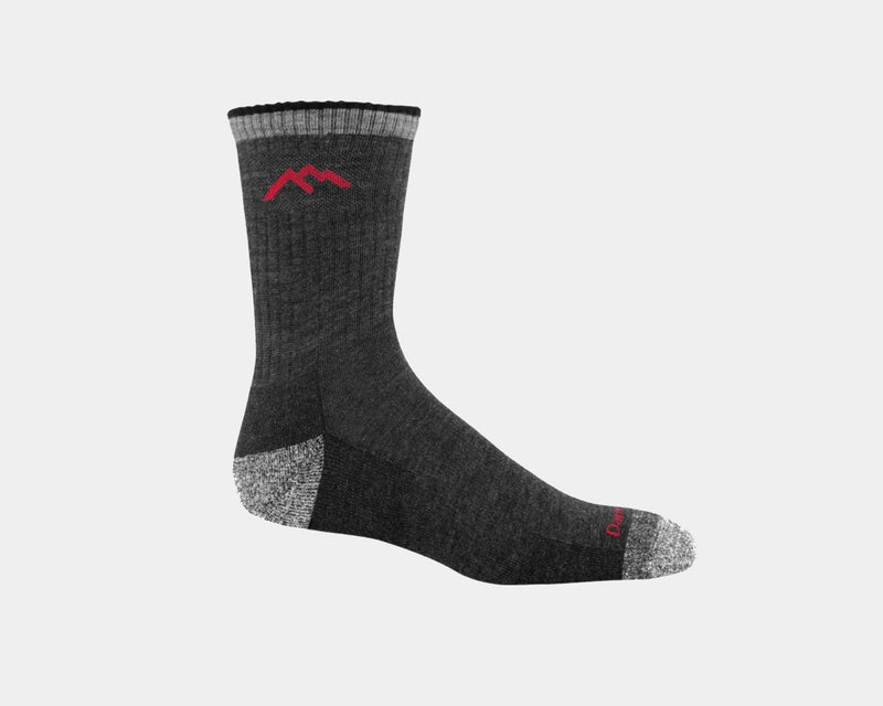 Darn Tough Hiker Micro Crew Cushion socks in charcoal gray with reinforced heel and toe, side view showing red logo accents.