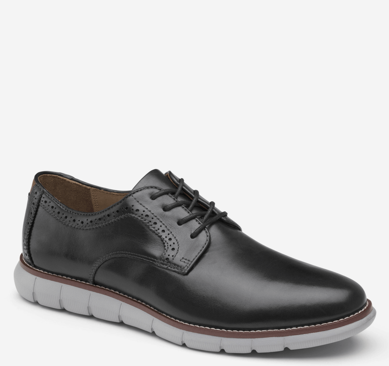 Johnston & Murphy Holden Plain Toe shoes in black leather with brogue accents, white cushioned outsole, and lace-up closure, side view.