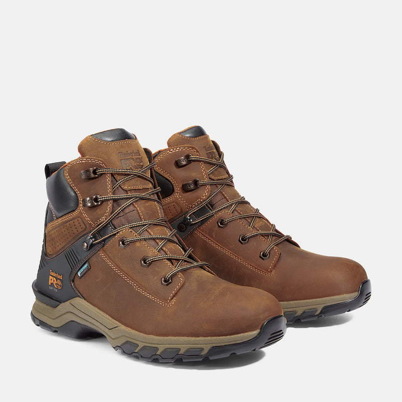 Timberland Pro Hypercharge 6" Soft Toe Work Boots in brown leather with black accents, lace-up design, and durable outsole, angled front view.