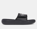 Under Armour Ignite Pro 8 Slides in black with adjustable strap and cushioned footbed, side view.