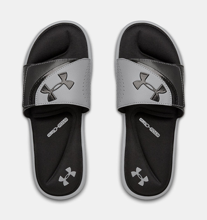 Under Armour Ignite VI SL slides in gray and black with perforated strap, foam cushioning, and logo detailing, top view.