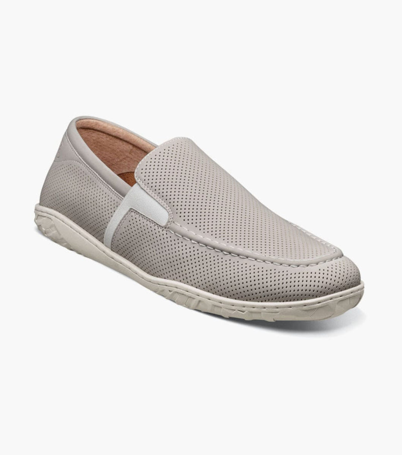 Stacy Adams Ilan loafers in light gray with perforated leather upper and flexible rubber sole, side angle view.