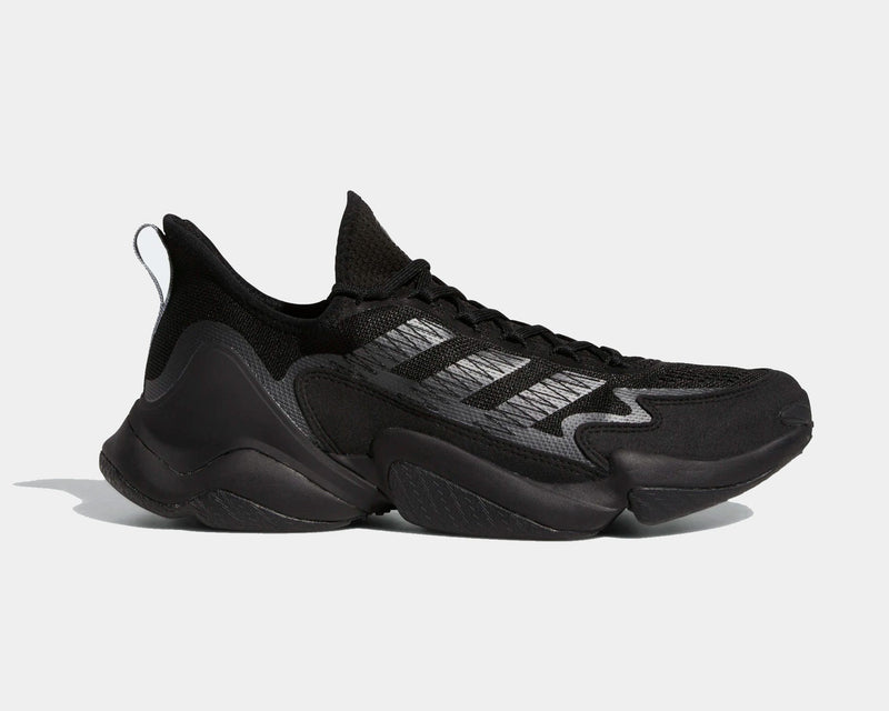 Adidas Impact FLX shoes in black with mesh upper, three-stripe detailing, and sculpted midsole, side view.