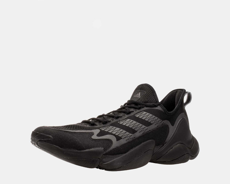 Adidas Impact FLX sneakers in black with mesh upper, textured overlays, and lace-up closure, front-side view.