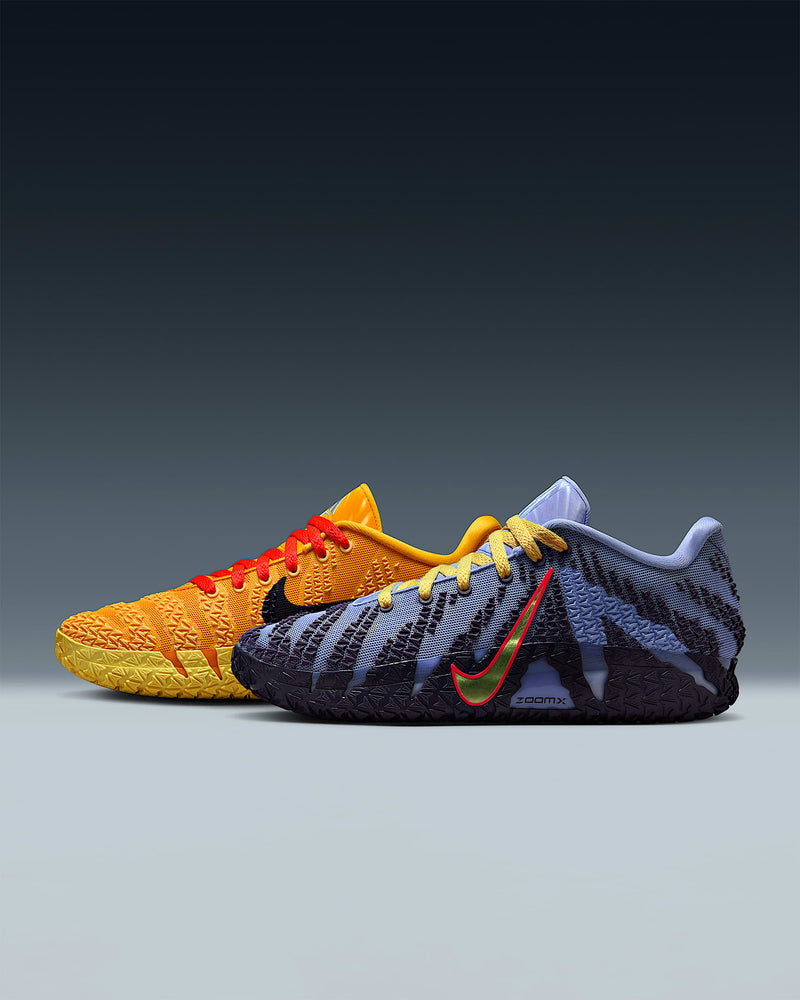 Nike Ja 3 "Channel 12" basketball shoes, side view showcasing mismatched design with orange and yellow on the left shoe and blue with black tiger stripes on the right shoe, ZoomX midsole, and vibrant contrasting accents.