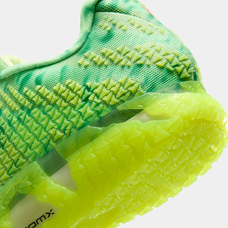 Nike Ja 3 "Halloween" basketball shoes featuring a close-up view of neon green and yellow textured mesh upper with a translucent outsole.