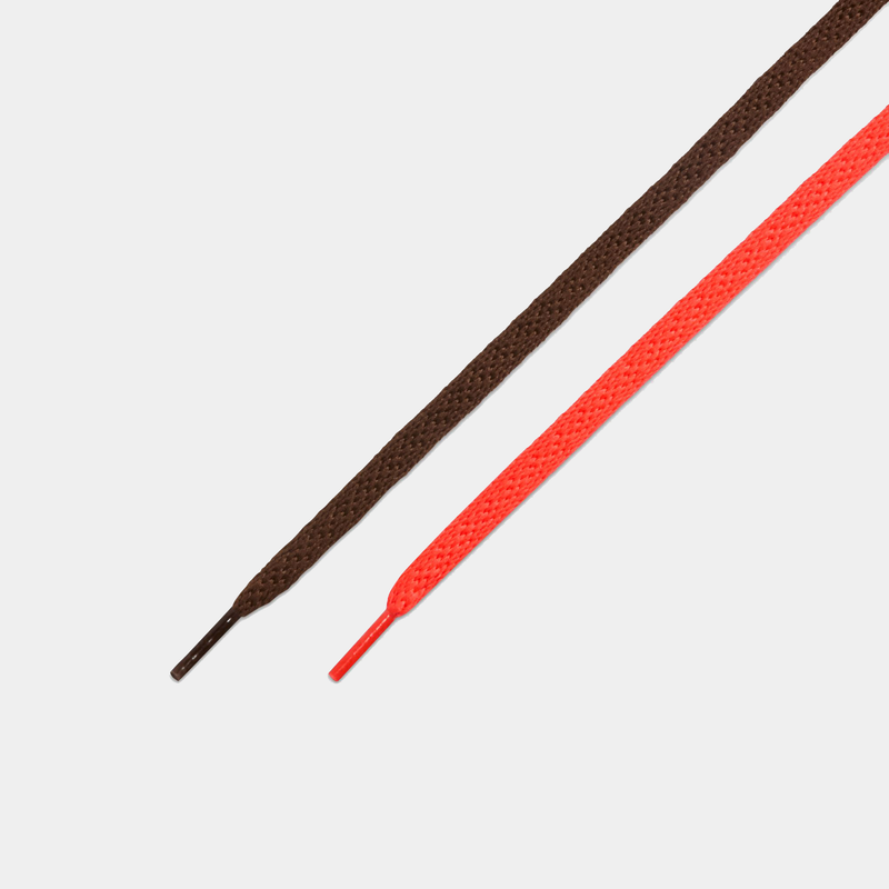 Nike Ja 3 "Halloween" shoelaces in brown and vibrant orange, flat design with plastic aglets.
