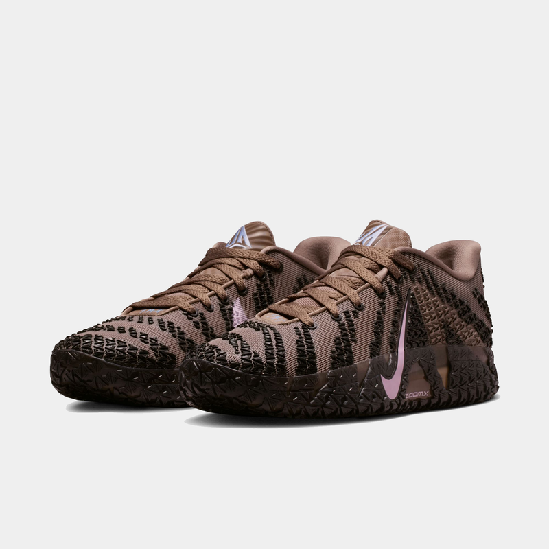 Nike Ja 3 "Mink Brown" basketball shoes in mink brown with black textured accents, pink Nike Swoosh, and patterned outsole, front angle view.