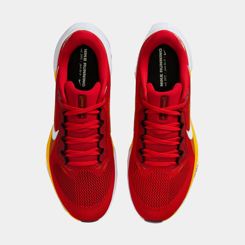 Nike Kansas City Chiefs Pegasus 41 running shoes with red mesh upper, yellow accents, and white swoosh logo, top view.