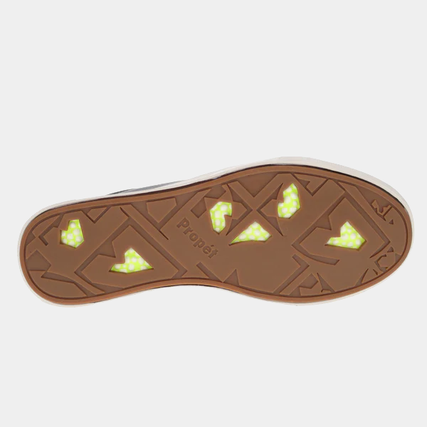 Propét Koda shoe outsole in brown rubber with textured pattern and neon green accents.
